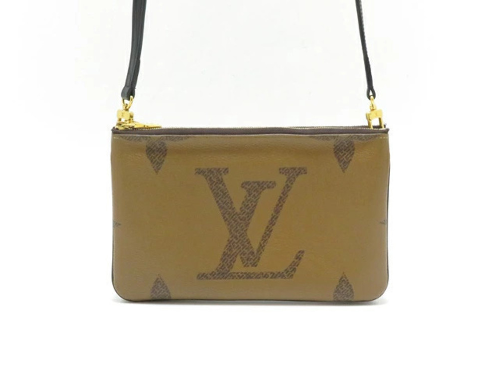 LOUIS VUITTON Pochette Double Zip Monogram Giant Reverse
